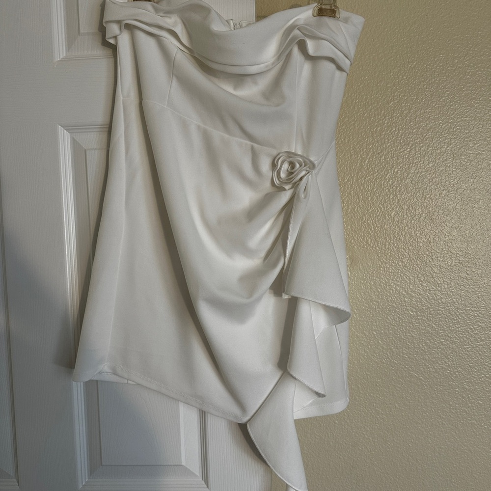 White mini dress with rose detail